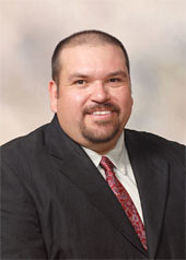 Daniel Rivera in suit and tie