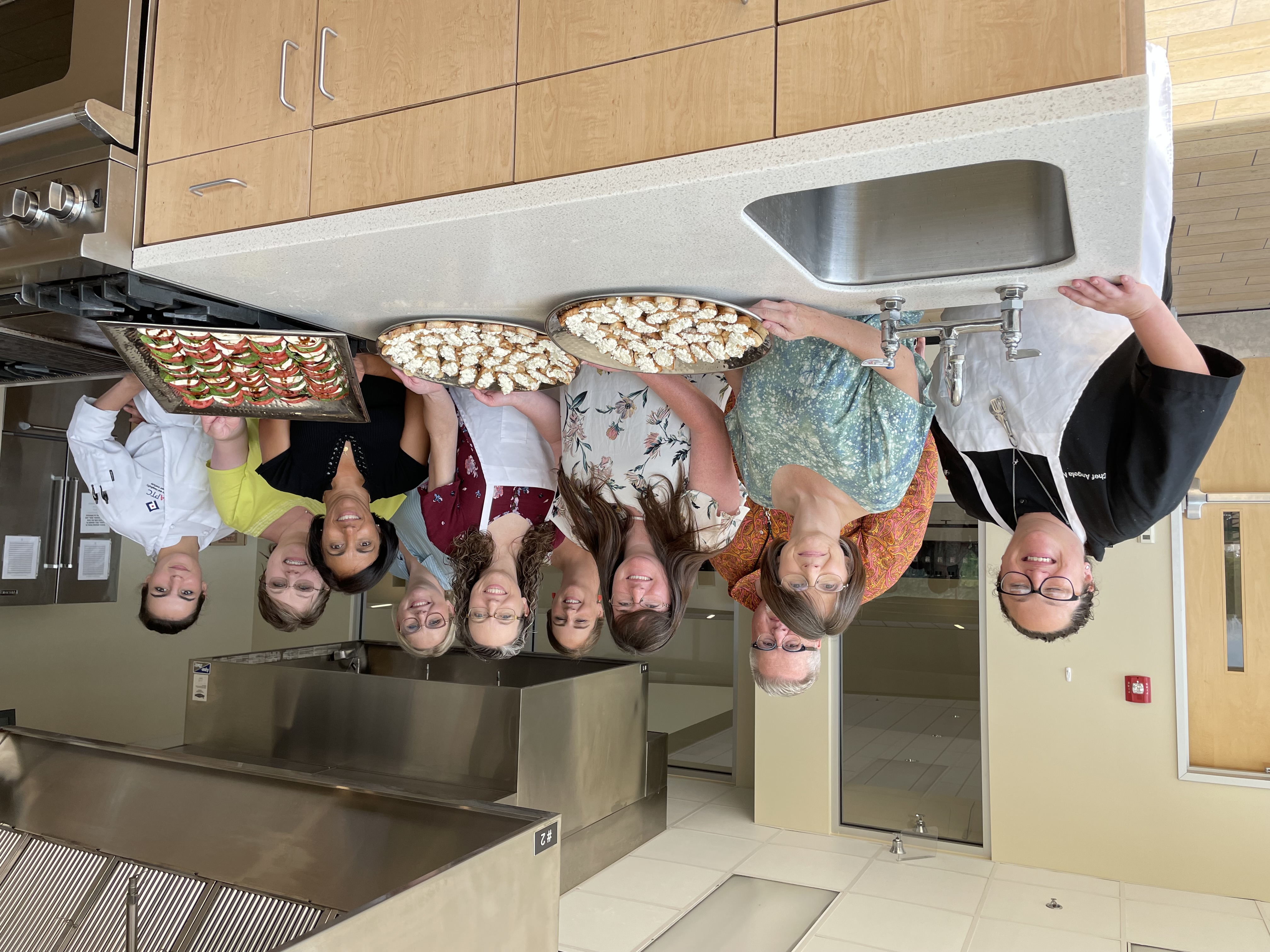Group photo of FCS agents who just learned to make their own cheese